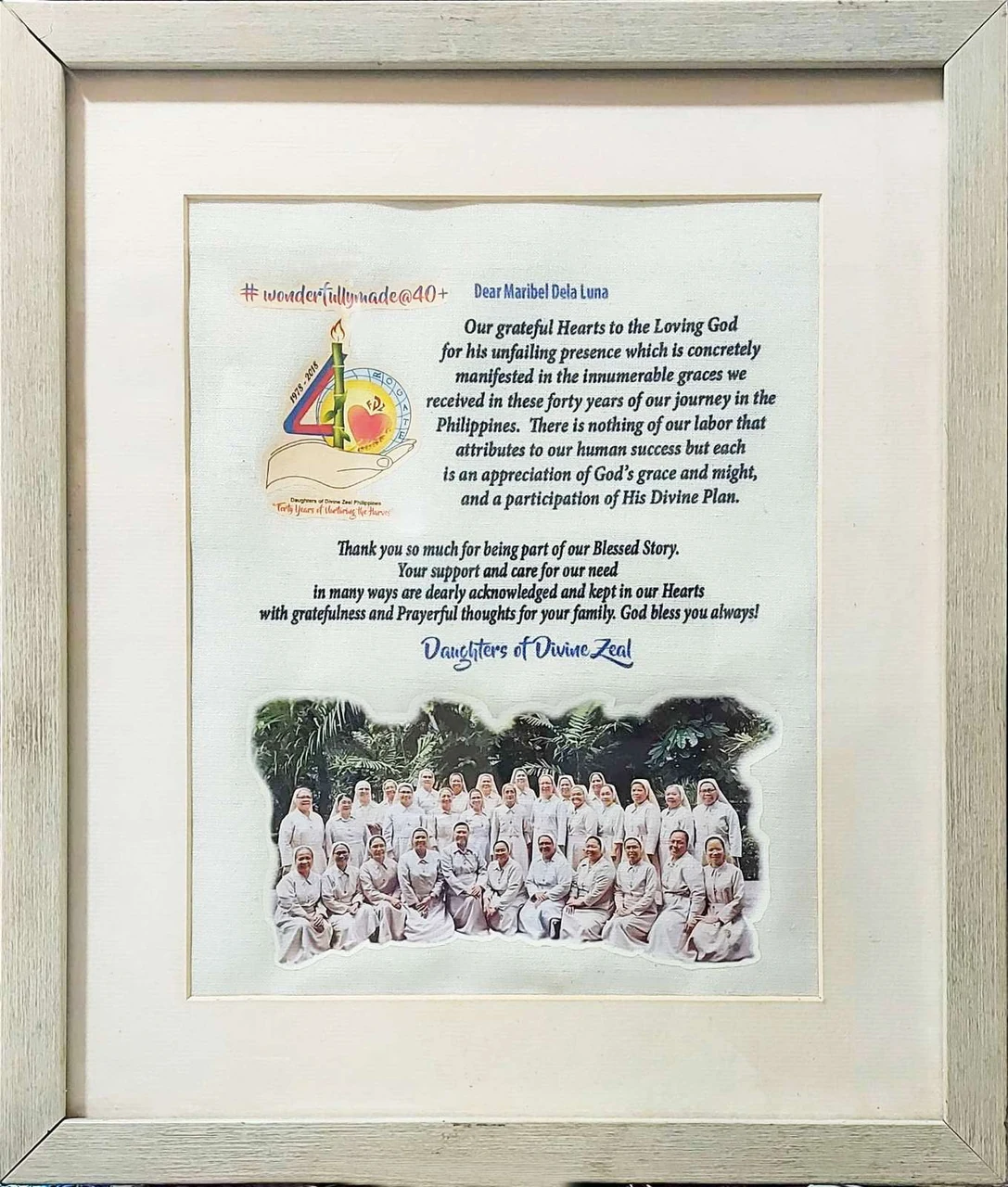 Framed message of appreciation from the Daughters of Divine Zeal