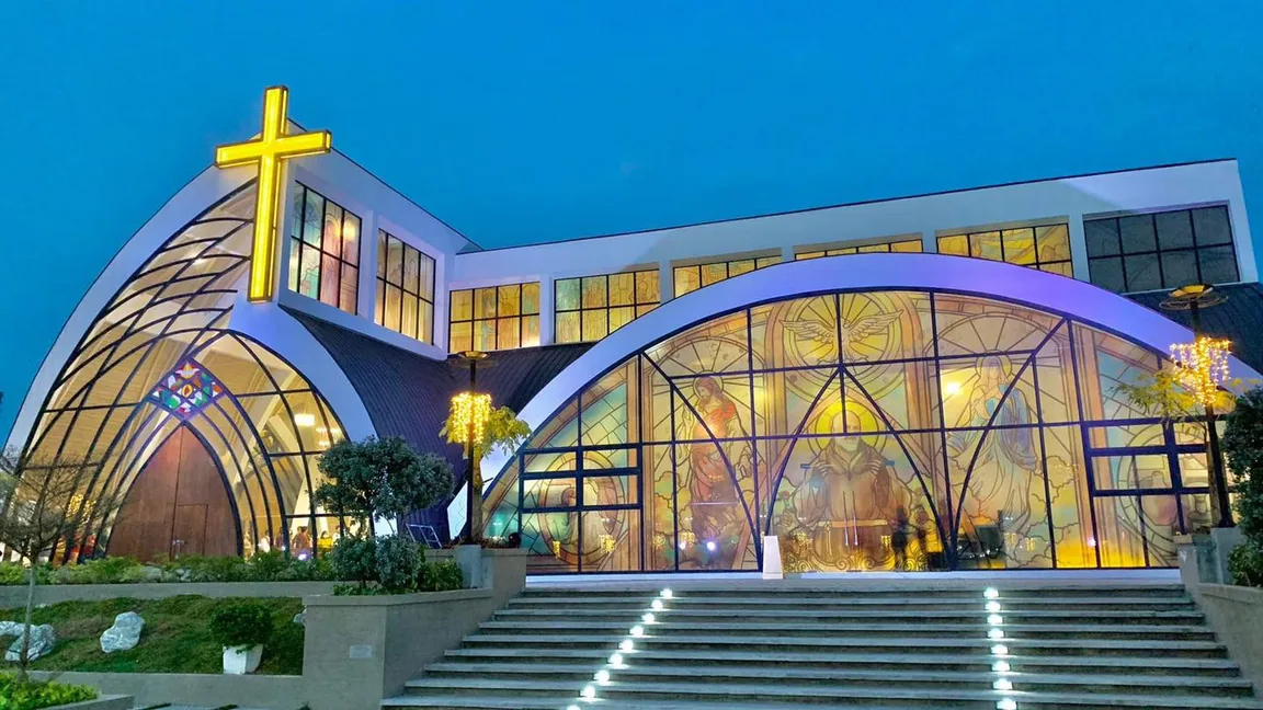 Modern church façade featuring art glass
